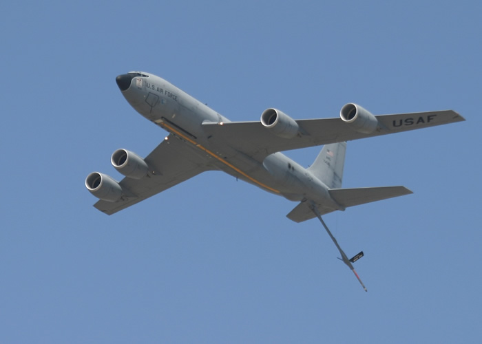 kc-135 in flight with boom extended
