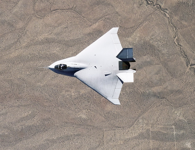 boeing x-32 in flight over desert