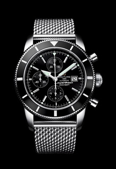 silver and black breitling watch