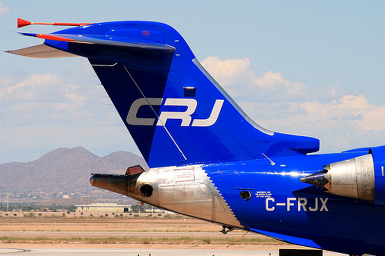 crj 1000 regional jet in blue