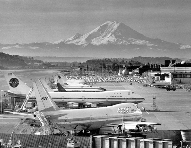 early 1960s photo of boeing company with first ever 737 and new boeing 747s