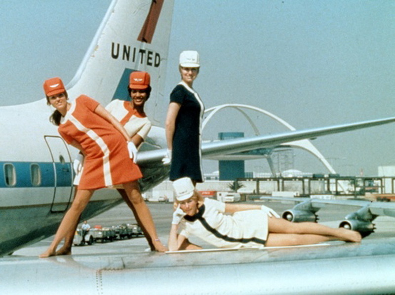 united flight attendants on airliner wing